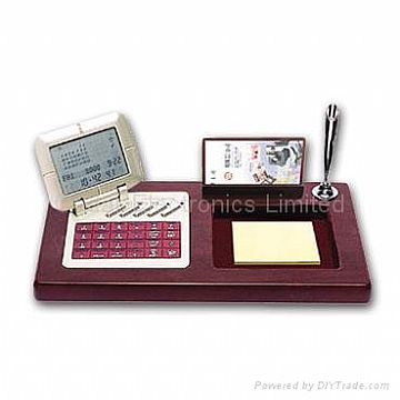 Calendar With Databank Calculator On Stationery Wood Base